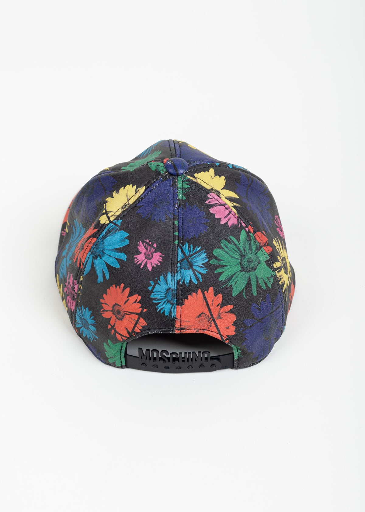 Back view of the cap showing the black adjustable strap embossed MOSCHINO
