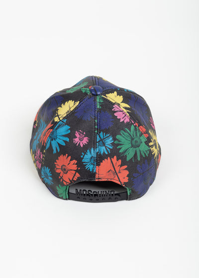 Back view of the cap showing the black adjustable strap embossed MOSCHINO